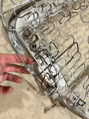 The driver side of the steelwork has a broken spring, so I’ll see if I can find that part?  Kind of hard to see in this pic.  The broken part has some black plastidip or something on it, so may have been replaced once already, don’t really know.