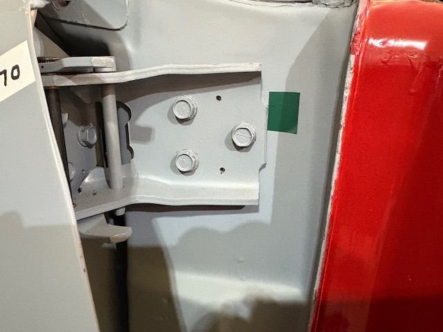 The small 1/8” holes are drilled to allow hinges to be removed and save the very time consuming location accuracy.  Holes just go far enough into the car body to get a good mark.  