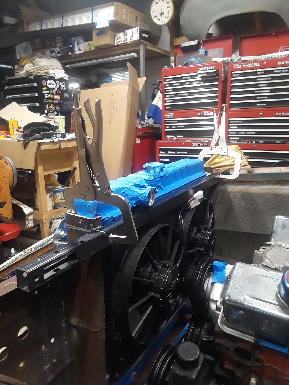 After shift caused interference with hood. Took this pic before rotating the cut off top to the back under the water inlet at top. I need to go back & dress-up the rotated top of the core support.