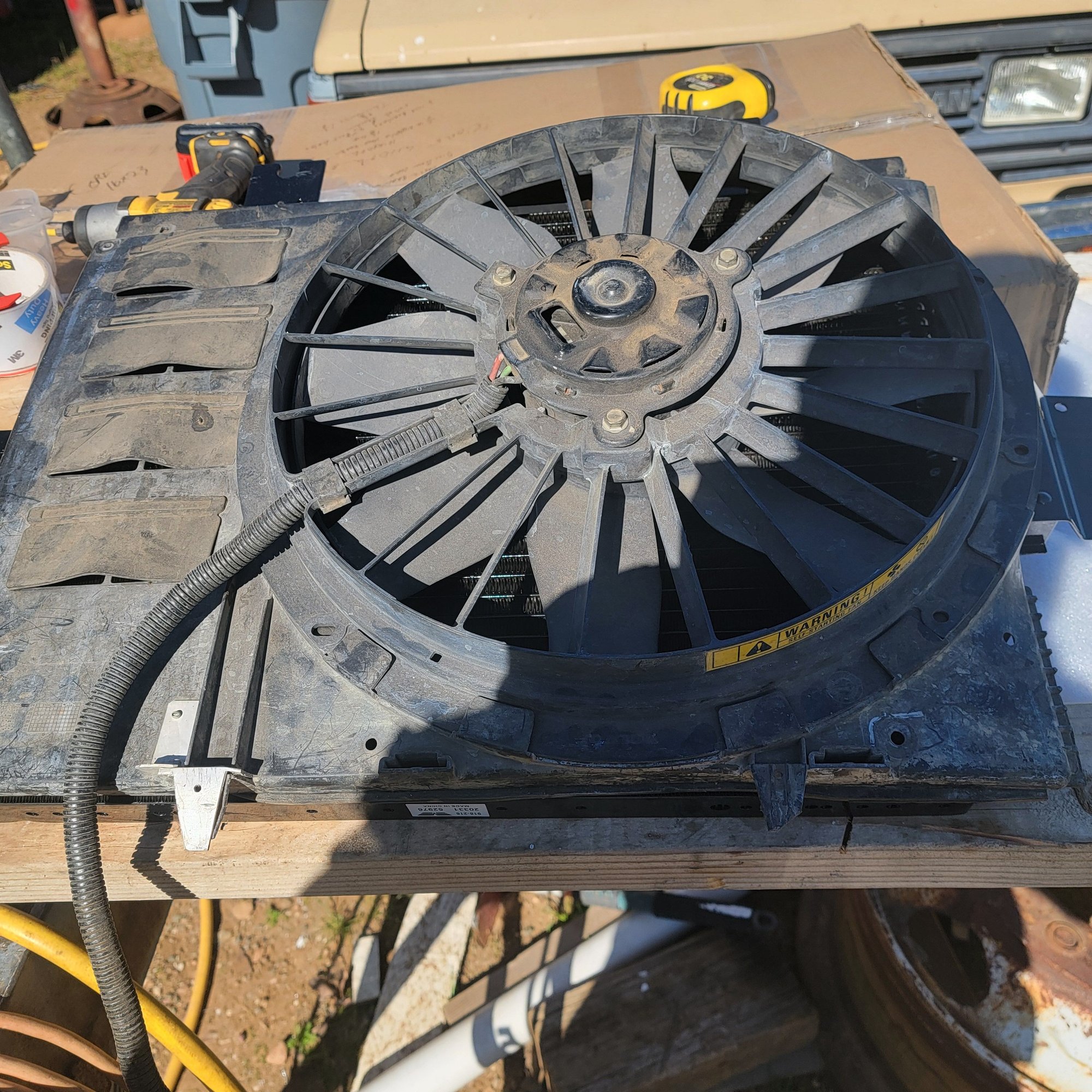 this fan is from a 93 volvo 960, I think its 2 speed, it covers that whole thing. but, I think, Ill be out of room under the bed. probably have to leave it in front of  the radiator. where one of these is residing now.