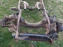 The abomination sits in the yard, ready to be junked. Even the mufflers, which were Isaacs favorite part, cant be reused. Apparently the PO used one that was 3", and found another that was smaller diameter, so he just cut it, and welded it, poorly like the rest of it. Itll get flowmaster 40s, but not these. 