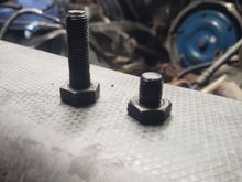 Is it because donor engine is was a 2wd.  Short bolts were for the 4wd?