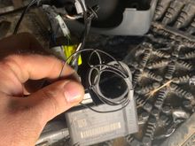 This black wire was wrapped around ignition where key goes but neither end goes to anything?