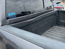 Anyone over see this? Towing my 5th wheel heard a loud bang, found this buckling in towards the hitch. I did have two folding tables strapped to the passenger side parallel to the cab. A 5 gal propane bottle and a large Bluetooth speaker forward left side of bed. No damage to anything other than the bed. Propane bottle never moved but my speaker did move on me, again no damage to the speaker. I had two jack straps crossed from one side of the bed to the other holding the tables in place. 