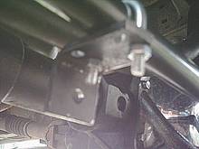 I decided to reuse my old track bar bracket and fab up a stabilizer mount. After about 90 minutes of cutting drilling and filing this is what I have. It needs some "refining" and another clamp. Cost so far...3.50 with two clamps
