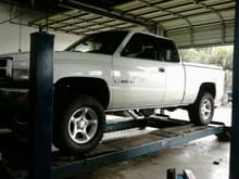 In the shop, gettin ready to lift it to put new tires on