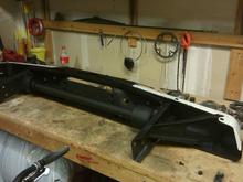 Undercoated bumper.