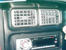 Painted dash bezel semi gloss black and painted guages with stainless coating.