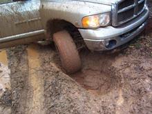 In a little rut.
Before Road Armor bumper install, All stock except for 33 inch Pro-Comp tires on stock wheels.