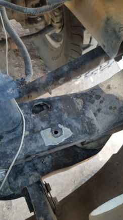 Lower radiator mount, drivers side. 1997 5.9 (360) Note the oblong hole. Passenger side extra hole is round.