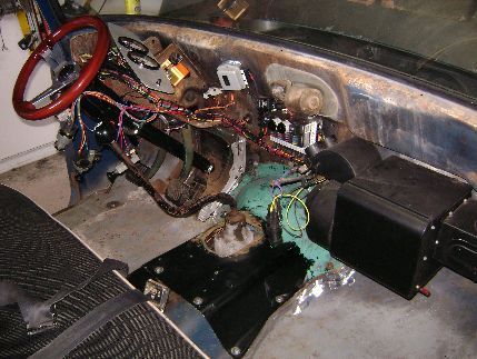 Trans tunnel cover and all the switches installed and waiting. Just need the brakes sorted out before installing the dash. 