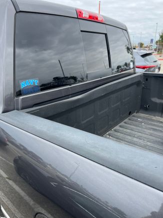 Anyone over see this? Towing my 5th wheel heard a loud bang, found this buckling in towards the hitch. I did have two folding tables strapped to the passenger side parallel to the cab. A 5 gal propane bottle and a large Bluetooth speaker forward left side of bed. No damage to anything other than the bed. Propane bottle never moved but my speaker did move on me, again no damage to the speaker. I had two jack straps crossed from one side of the bed to the other holding the tables in place. 