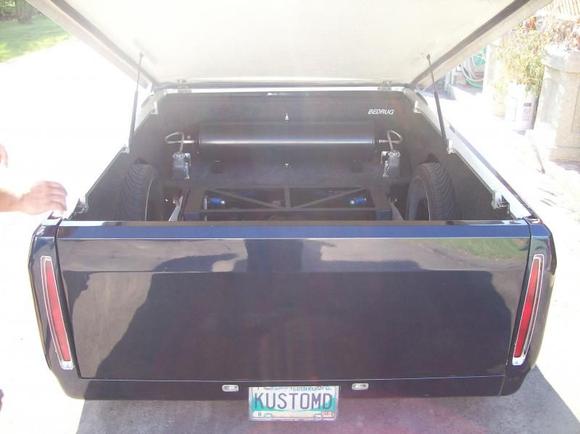 86 Cadillac Deville tail-lights, streetglow custom reverse lights, shaved tailgate, shaved rollpan, lorider tonneau cover.