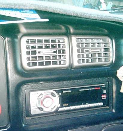 Painted dash bezel semi gloss black and painted guages with stainless coating.