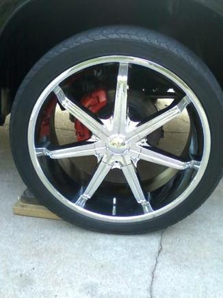 Newly panted calipers. till I replace rotors and calipers. also painted the inside of the rims black to clean em up.