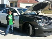 Baby  Angel with before pic of car...he said he wants this car to be ready for high school