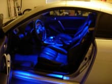Blue V-LEDs in the doors, domes, and trunk.  Some say its rice, but I like it.