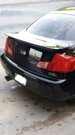 Shaved "infiniti" letters, tanabe exhaust and added wing.