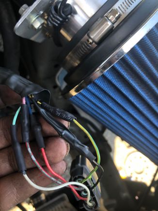 Picture I took after i fixed the wires ( soldered and wrapped) 
Excuse the dirty hands 
