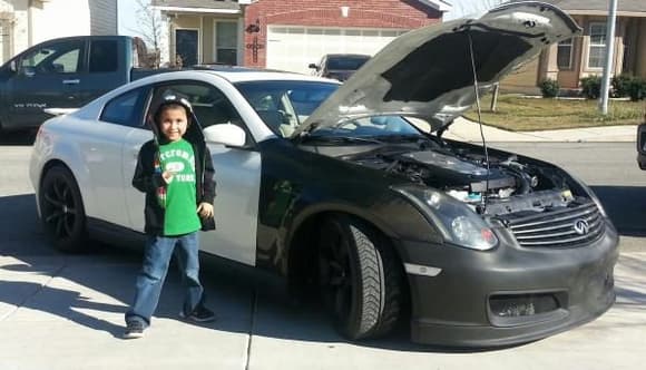 Baby  Angel with before pic of car...he said he wants this car to be ready for high school