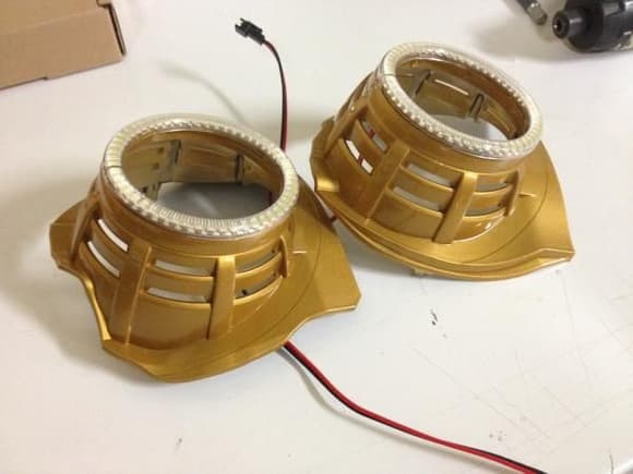 Projectors painted gold w/ LED ring