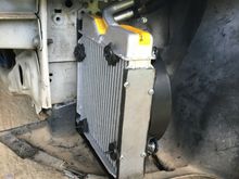 It fits nicely, but no shroud...


