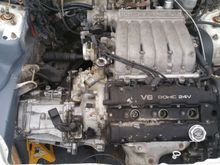 Pulled out the 5sp FWD, mounted up the 6sp AWD and started cleaning up the engine bay. Still the N/A dodge stealth engine inside, the TT block still sitting on the engine stand, not installing until the car is ready.