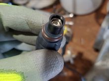 Also not sure if the black plastic around the tip of the injector is supposed to be removed, or thats just how it is?  