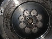 From this picture, I’m going to summarize a series of failures. 
1. Broke pass. Side axle but didn’t realize, 
2. dropped and opened trans to find nothing wrong,
3. Friend was guiding me/could not get trans cases to click together tapped on input shaft to see if that would help. 
4. Slightly mushroomed input shaft tip/got case together lol
5. Input shaft pressed on pilot bearing instead of seating inside. Replace axle. 
6. I ran it because of hardship, needed car to drive. 