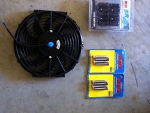 12 in slim puller fan, ARP extended studs (required for slicks) and open ended lug nuts.