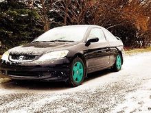 Plastidiped the wheels teal because I thought it was going to be bright and awesome...it wasn't