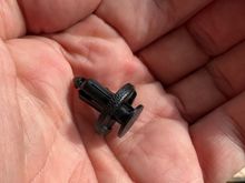 Clip needs to go through the splash guard hole and the hole from the old clip.