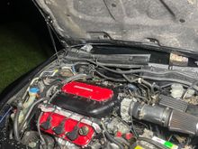 wiring wasnt fully finished in the photo so if u see loose cables here. this was just a photo i took not too long after  i dropped the engine in and was working on the wiring still at the time of photo