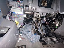 You can see next to the kick panel there are random wires laying disconnected, some with labels too. Wondering if that might be part of an aftermarket kit?