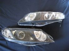 My headlight v3 (06-11 civic sedan)

S2000 AP1 projectors
S2000 shrouds w/ custom extensions