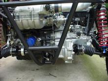 Converted cable linkage to mechanical. Straight cut M Factory gearset. 5.15 ring and pinion, Wavetrac diff, 930 Porsche joints, 16" of wheel travel in the rear, 18" in the front.