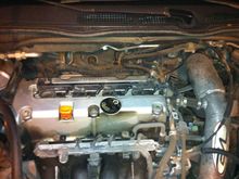 plug cover and intake cover removed. big whoop!