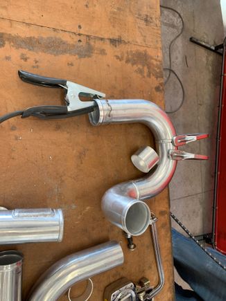 I had the piping modified to work better for me.. 
1. Added a weld bung for IAT to tuck it.
2. Added tabs on the underside of pipe that connects to TB, to hold and tuck the vacuum line from BOV to IM. 
3. Lengthened that same pipe by 2.75”
4. Shortened the pipe that connects from the intercooler to the BOV Pipe.. I shortened this one and lengthened the other to clean the torque mount bracket and torque mount.
5. Added a 1/8th NPT weld bung on hot side of piping for boost reference. 