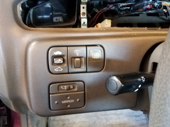 Rear defrost relocated to left side of dash (where cruise used to be)