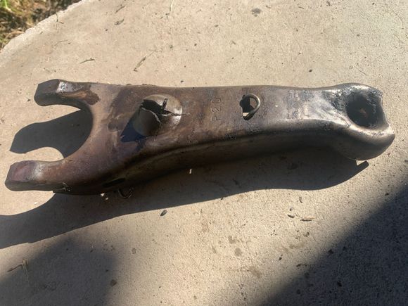 Took some force to get this off , it is cracked and stuck in that metal ball on the trans.