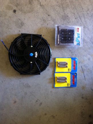 12 in slim puller fan, ARP extended studs (required for slicks) and open ended lug nuts.