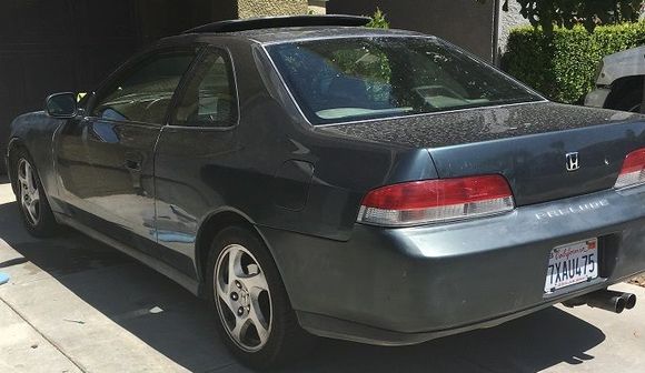 Car is Dirty but Driver side is pretty clean, Rear bumper has been wet sanded but not polished or waxed