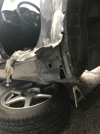 Ripping the totalled one off the car.