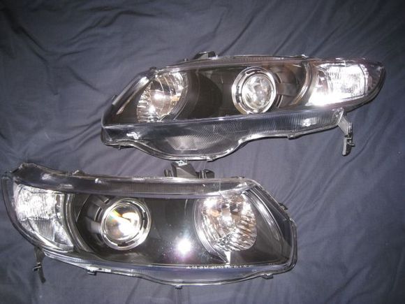 06-11 civic coupe

s2000 projectors (ap1) color modded with tsx-r lenses
gatling gun shrouds