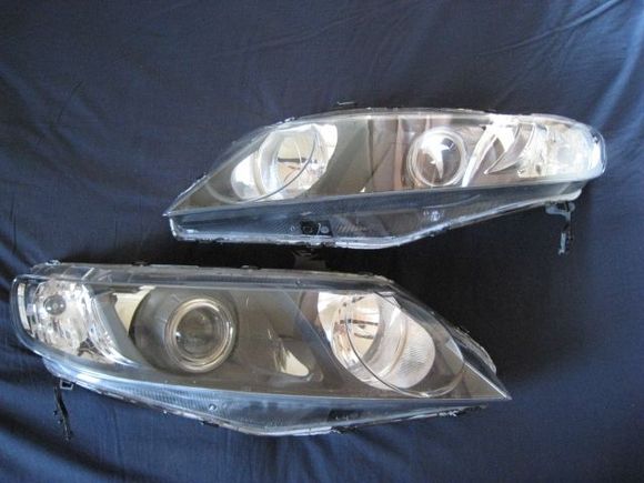 My headlight v3 (06-11 civic sedan)

S2000 AP1 projectors
S2000 shrouds w/ custom extensions