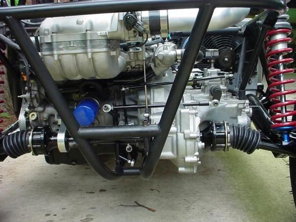 Converted cable linkage to mechanical. Straight cut M Factory gearset. 5.15 ring and pinion, Wavetrac diff, 930 Porsche joints, 16" of wheel travel in the rear, 18" in the front.