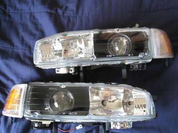 90-93 honda accord
morimoto mini h1 projectors
gatling gun v.2 shrouds
refelctor painted black
shroud painted gunmetal
