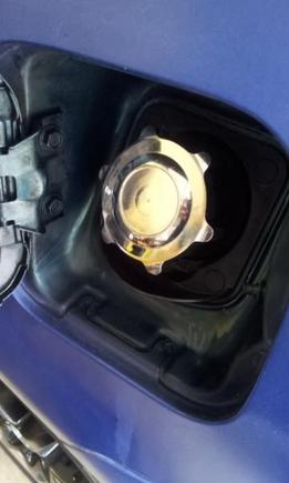 Solid billet gascap. Not one of those funky "JDM" gascap covers. Not for everybody but then again it's a one-off so it's not for everybody.