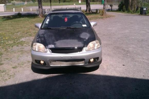 My Civic with 99 front end conversion and type r lip.