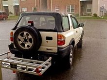 My wimpy Harbor Freight cargo carrier that got destroyed when I got rear-ended.....thank God. Gonna' weld-up my own cargo carrier.
